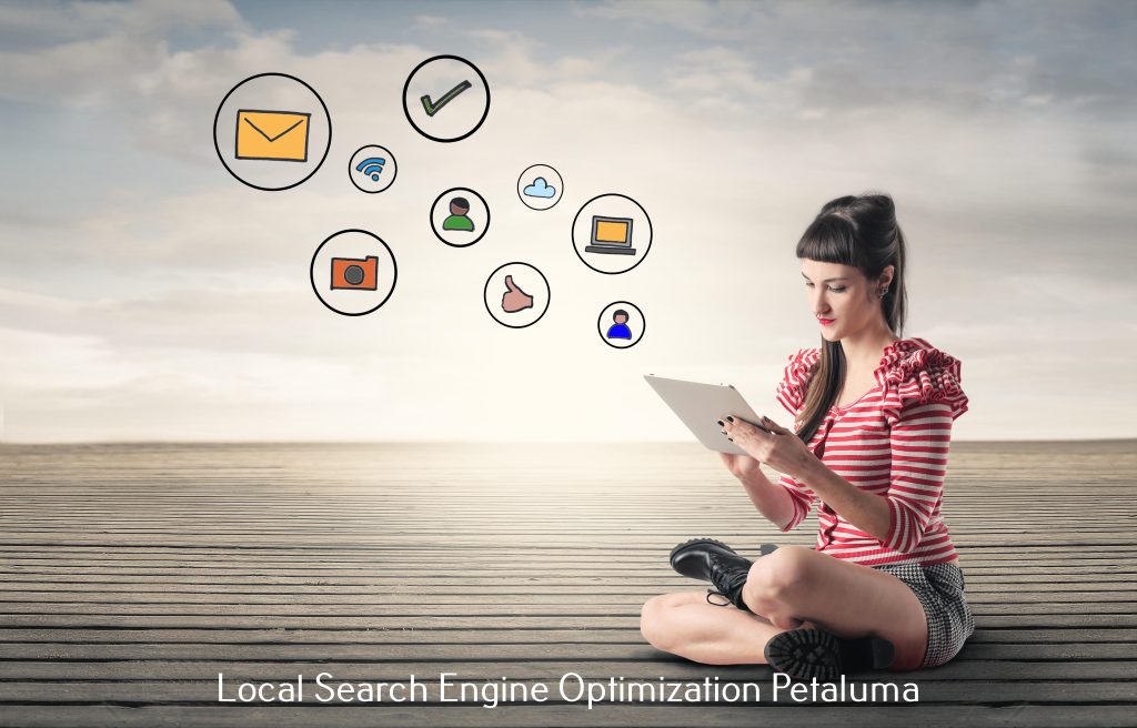 A woman sitting on the ground with a tablet and the words local search engine optimization platforms.