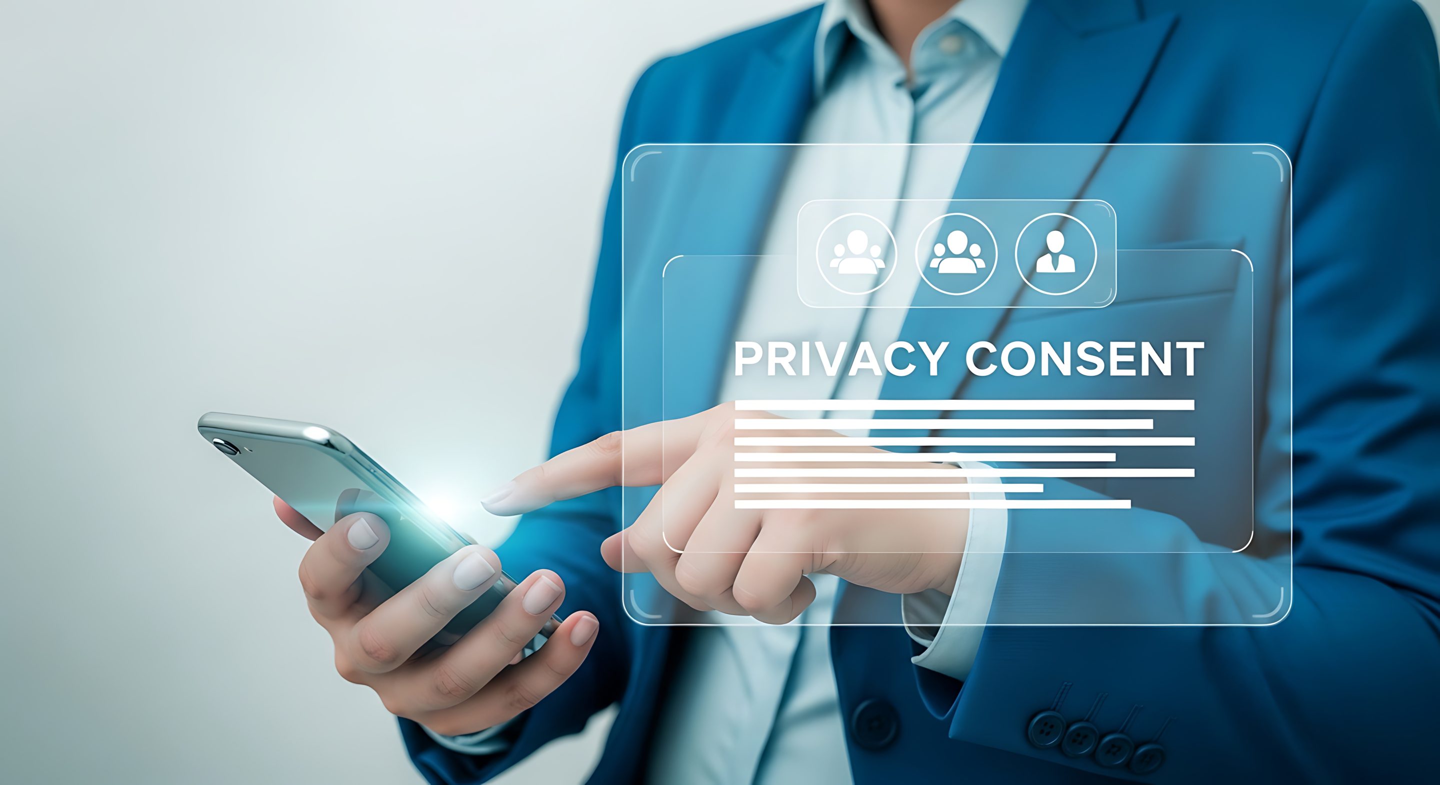 A person in a blue suit uses a smartphone with a transparent digital overlay displaying the words "Privacy Consent" and user icons, symbolizing digital privacy and data protection. A person in a blue suit uses a smartphone with a transparent digital overlay displaying the words "Privacy Consent" and user icons, symbolizing digital privacy and data protection.